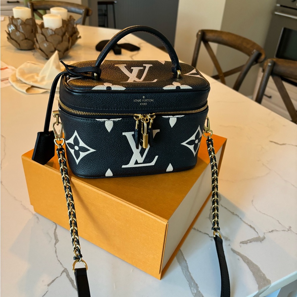 Louis Vuitton Bicolor Monogram Empreinte Leather Bag in black and cream